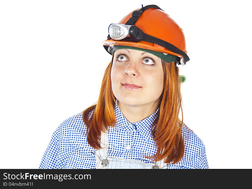 Girl worker in helmet observes