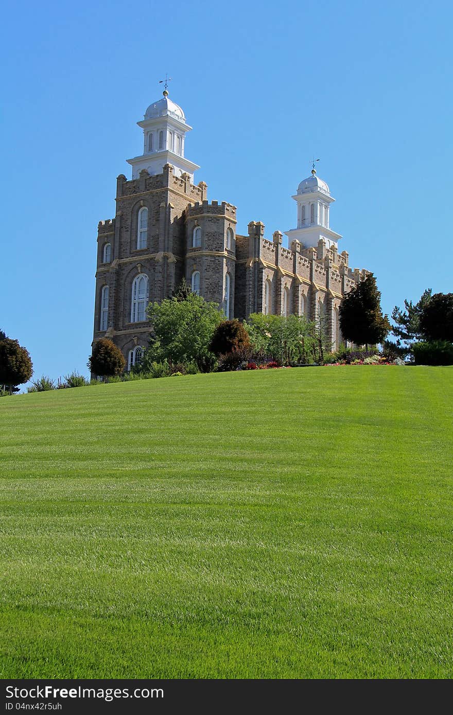 Image of the Logan Utah mormon temple with grass in the foreground - use for text