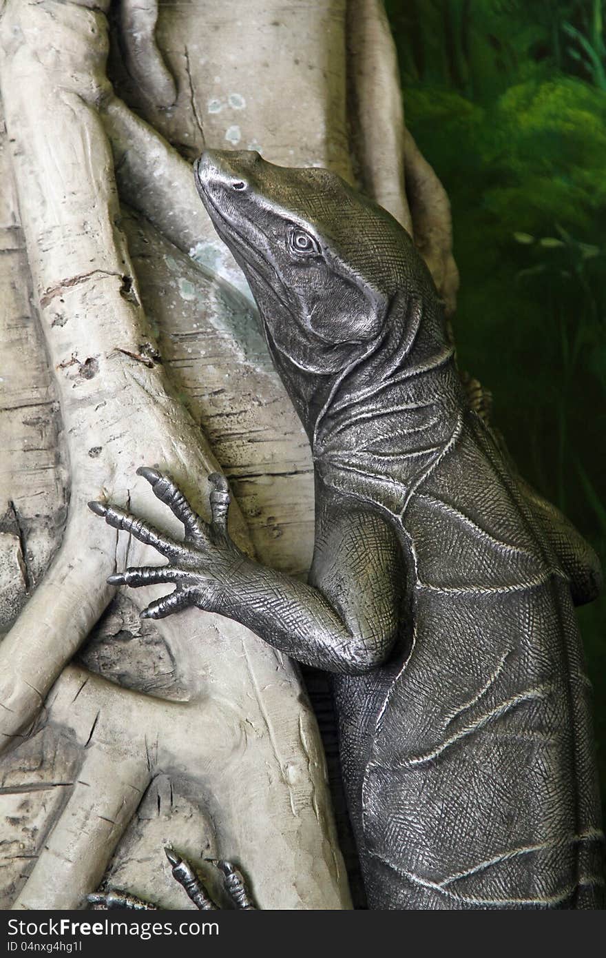 Monitor Lizard Sculpture On Tree