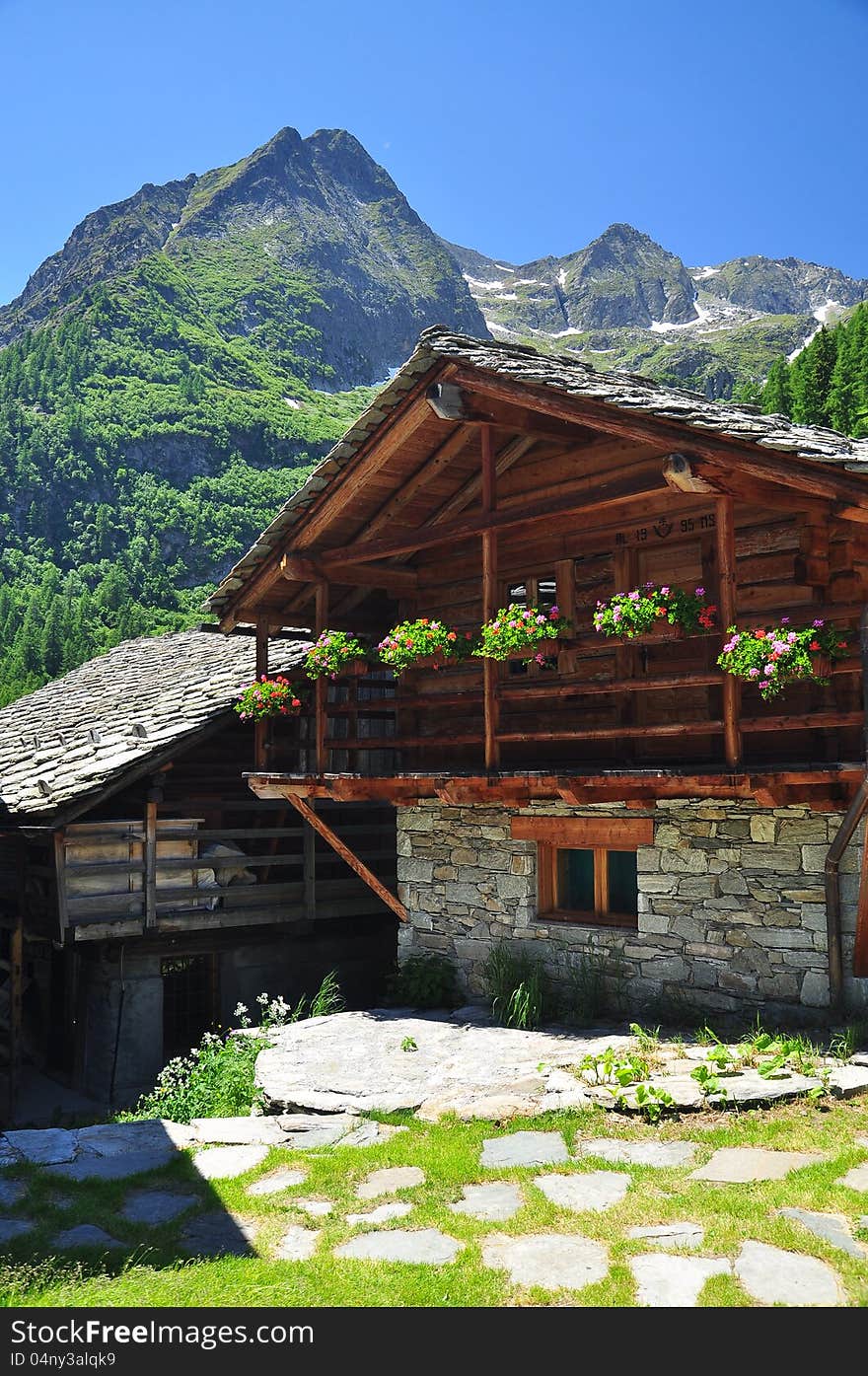 Traditional alpine architectute. Mountain houses in Alpenzu, Gressoney, Aosta Valley. Traditional alpine architectute. Mountain houses in Alpenzu, Gressoney, Aosta Valley.