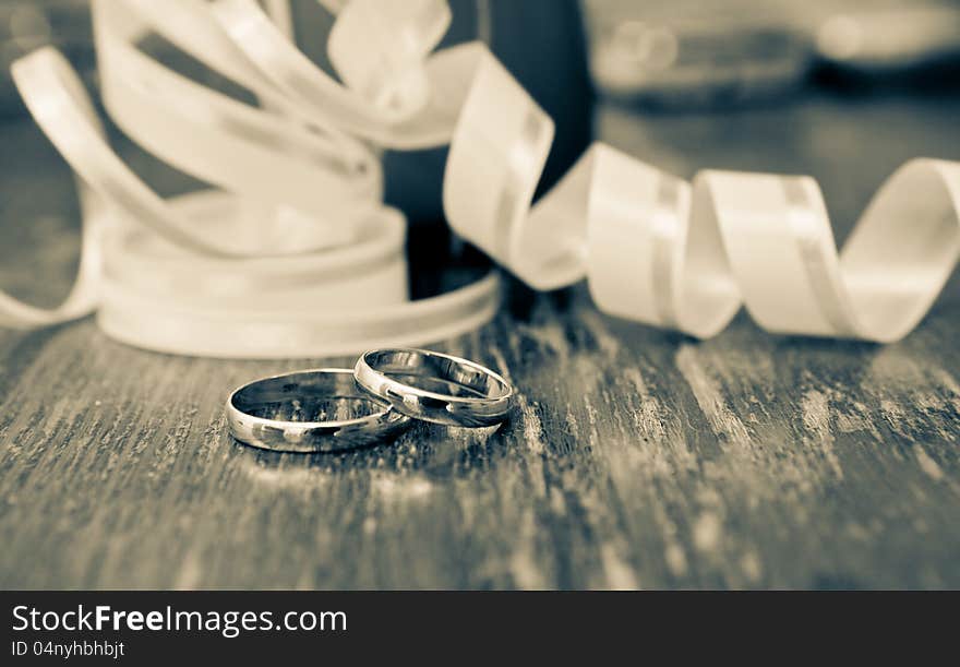 Gold rings of the groom and the bride on a table