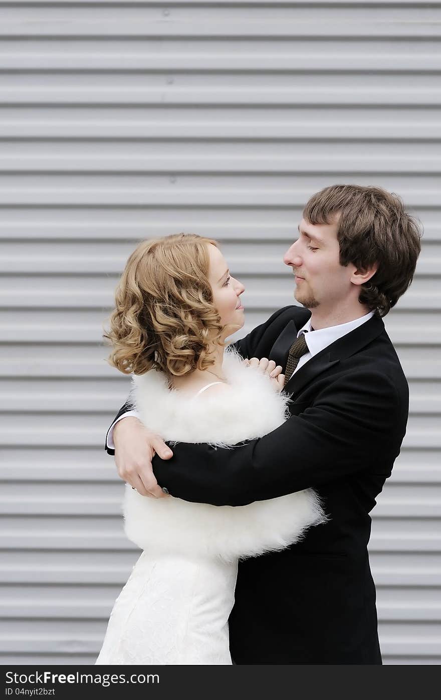 Happy bride and groom outdoors