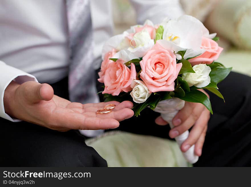 Wedding rings on a hand of the groom