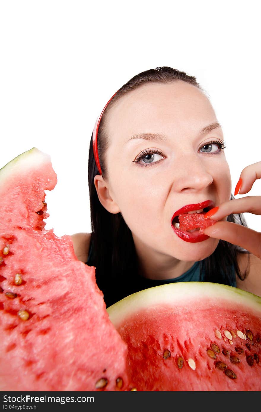 Brunette girl eating fresh watermelon isolated