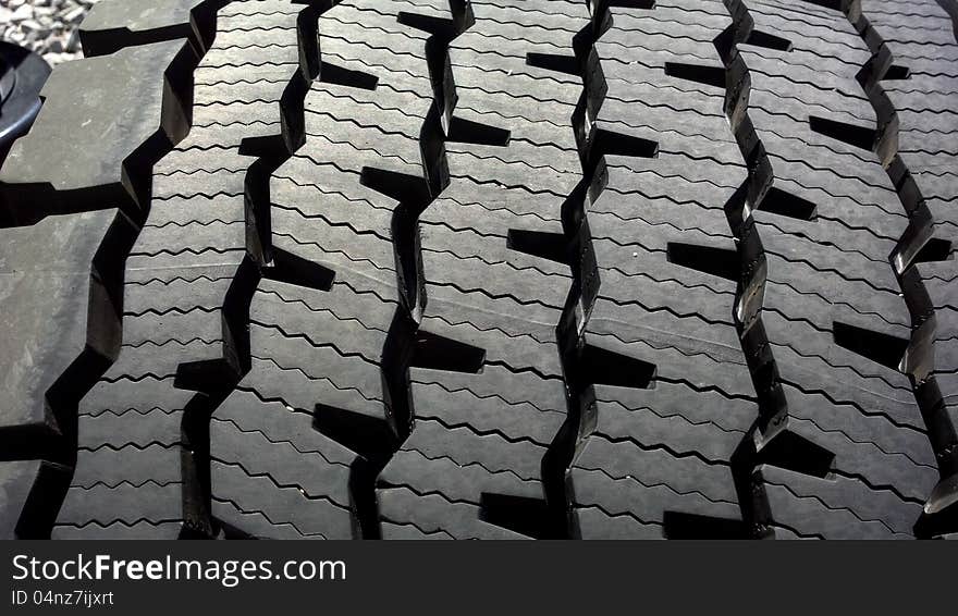 Image of the top of a super single semt truck tire tread pattern