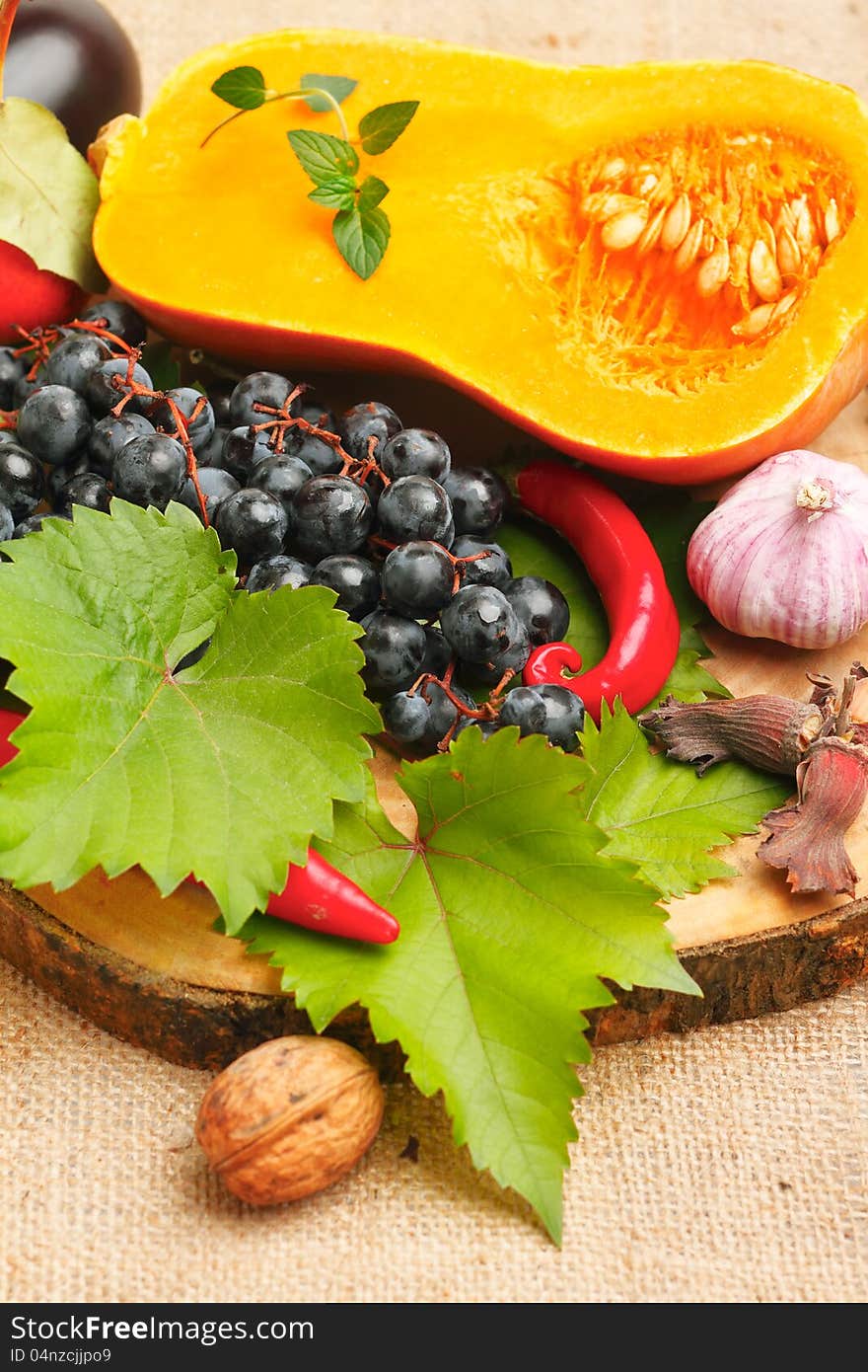 Autumn vegetable and fruits on old wood. Autumn vegetable and fruits on old wood