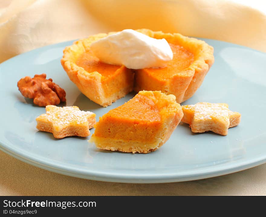 Homemade mini pumpkin pie with nuts. Homemade mini pumpkin pie with nuts