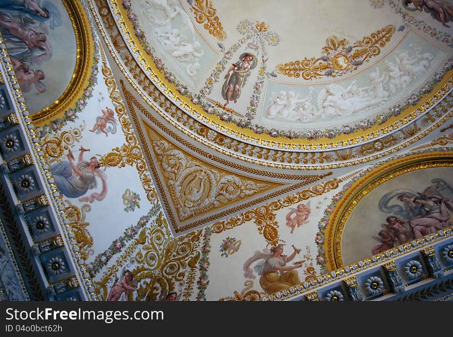 Ornate ceiling in palace, blue and golden colors. Ornate ceiling in palace, blue and golden colors.