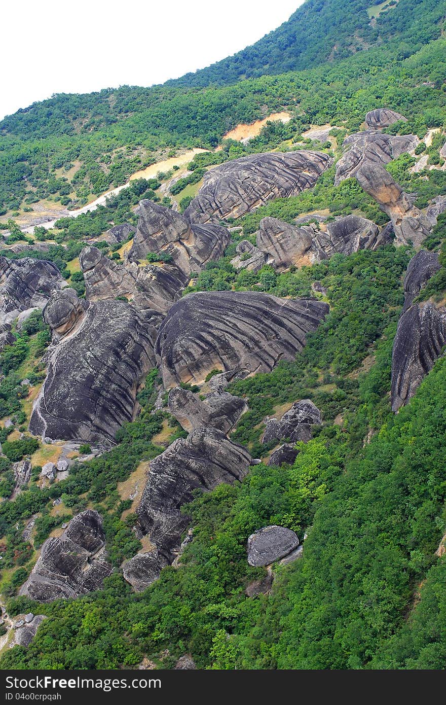 Field of black stones in Greece