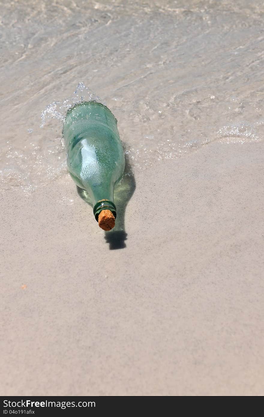 Message in a Bottle on Sand