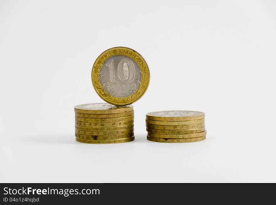 Two small piles of metal coins