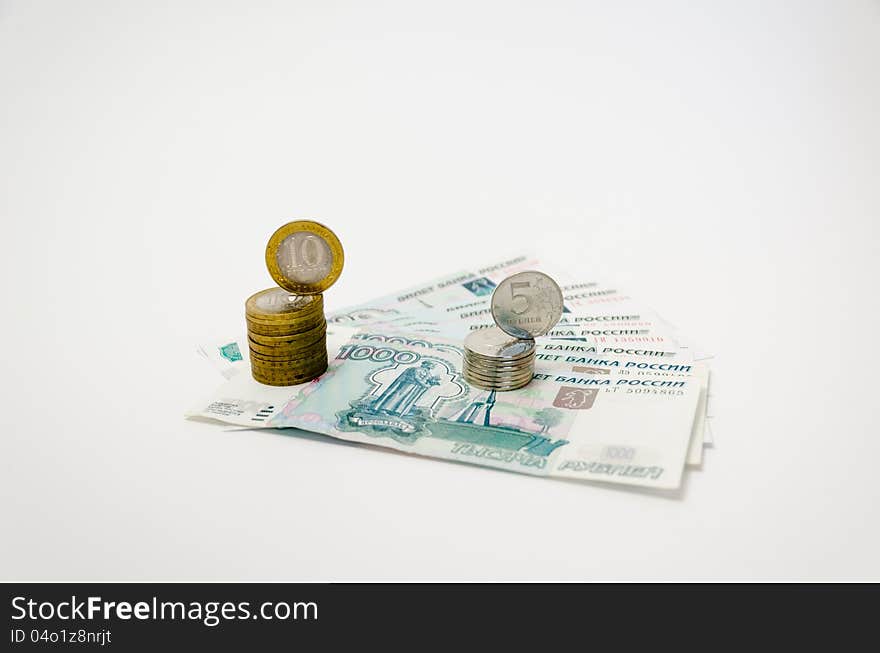 Two small piles of metal coins