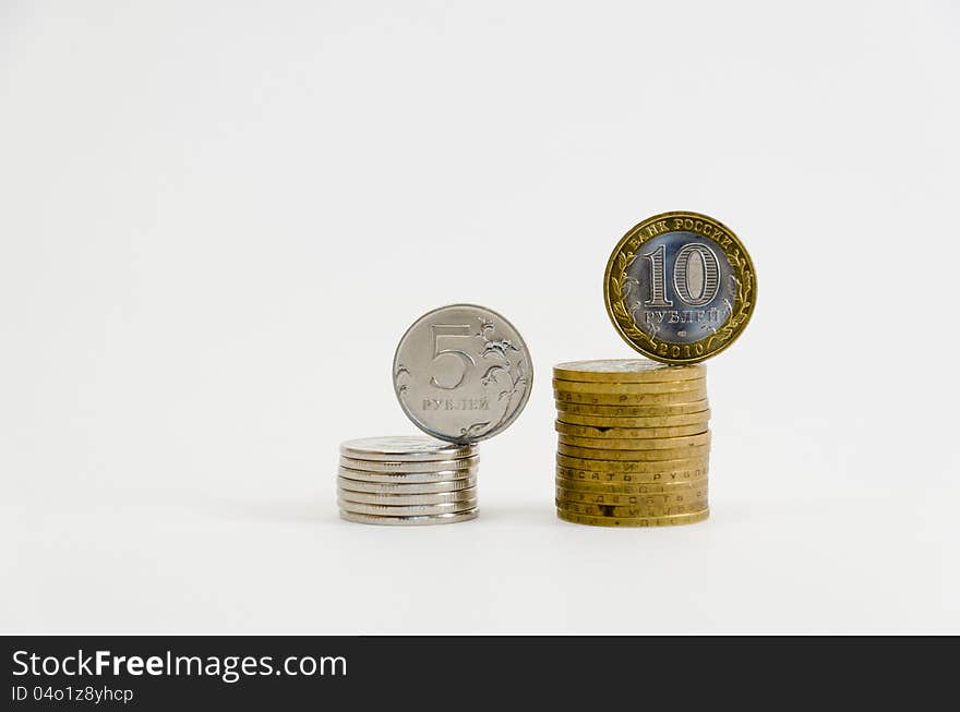 Two small piles of metal coins