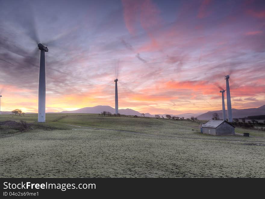 Shot taken of the Armaside Farm (Lake District) wind turbines on a winters morning. The sun was just rising. Some noise due to the long exposure used. Motion blur in the Wind turbines propellers. The Sun hadnt risen and the shot is lit only by ambient light. Some motion blur for the sheep moving around the landscape. Shot taken of the Armaside Farm (Lake District) wind turbines on a winters morning. The sun was just rising. Some noise due to the long exposure used. Motion blur in the Wind turbines propellers. The Sun hadnt risen and the shot is lit only by ambient light. Some motion blur for the sheep moving around the landscape