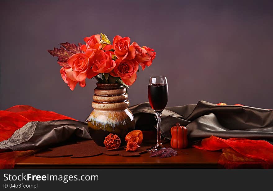 Still life with red wine and roses. Still life with red wine and roses