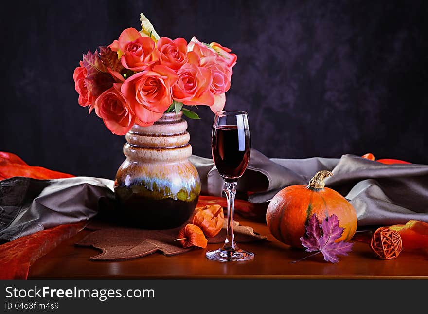 Still life with red wine and roses. Still life with red wine and roses