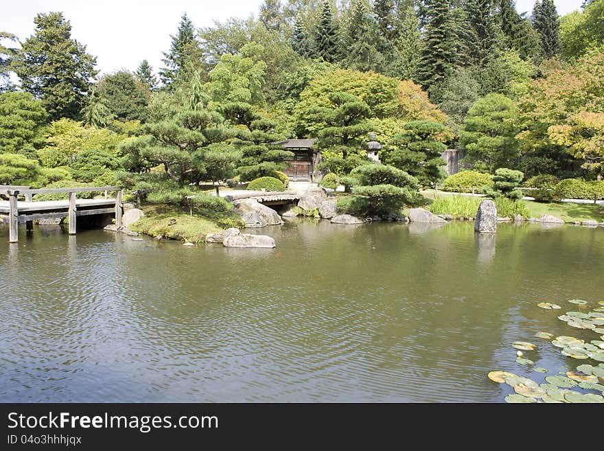 A picturesque Japanese garden with a beautiful pond.