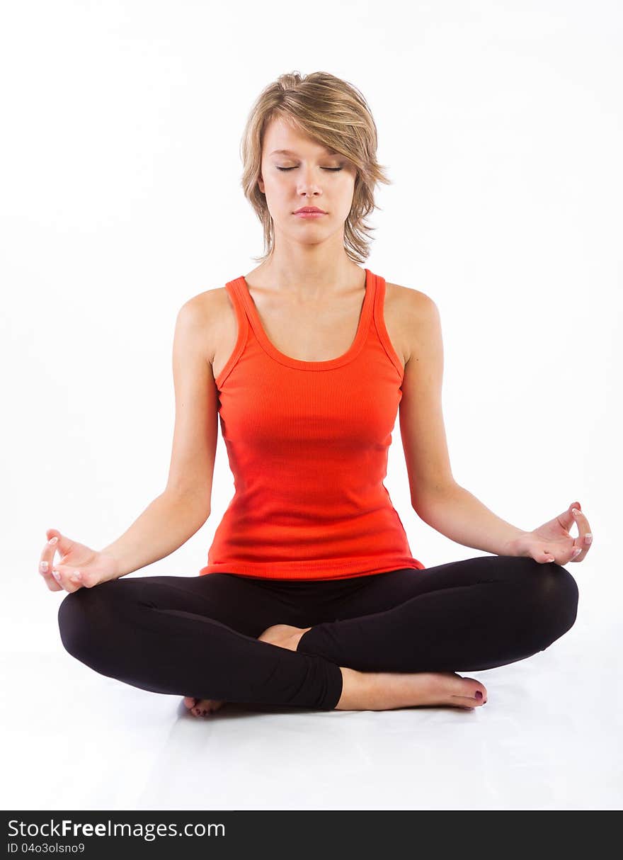 Studio portrait of beautiful blonde woman practicing fitness