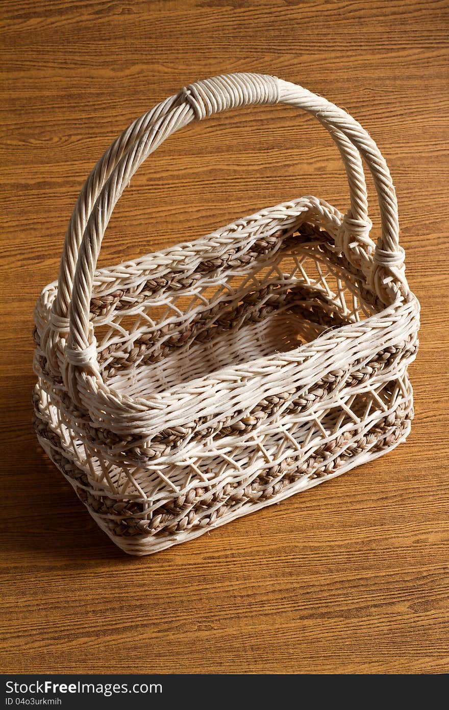 Basket On Wood Background