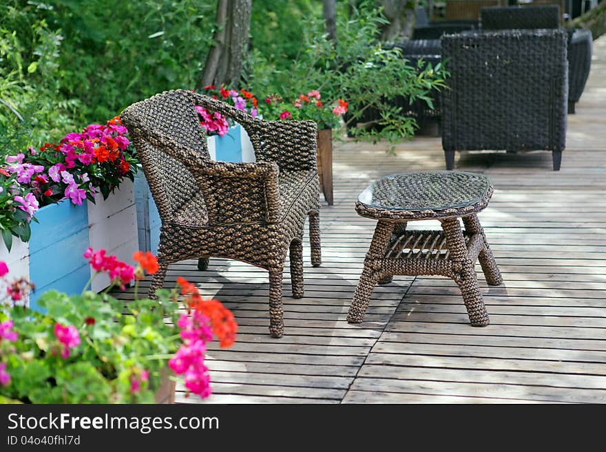 Rattan chair and table in empty cafe. Rattan chair and table in empty cafe