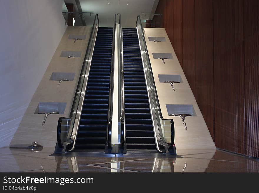 Escalator with art works on both sides