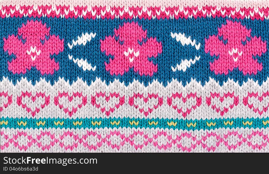 Knitted background with a simple pattern