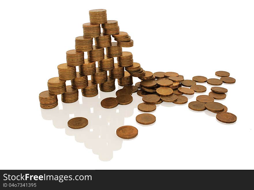 Ruined pyramid of coins, on white background. Ruined pyramid of coins, on white background