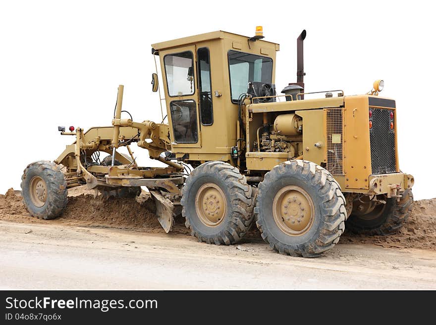 Grader road construction equipment, on white background with clipping path included.