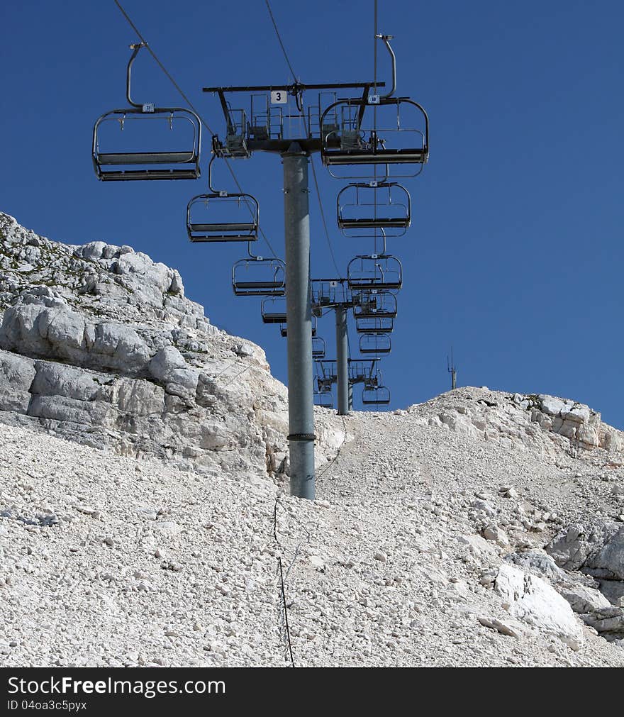 Chairlift in rocky mountains  in the summer time.