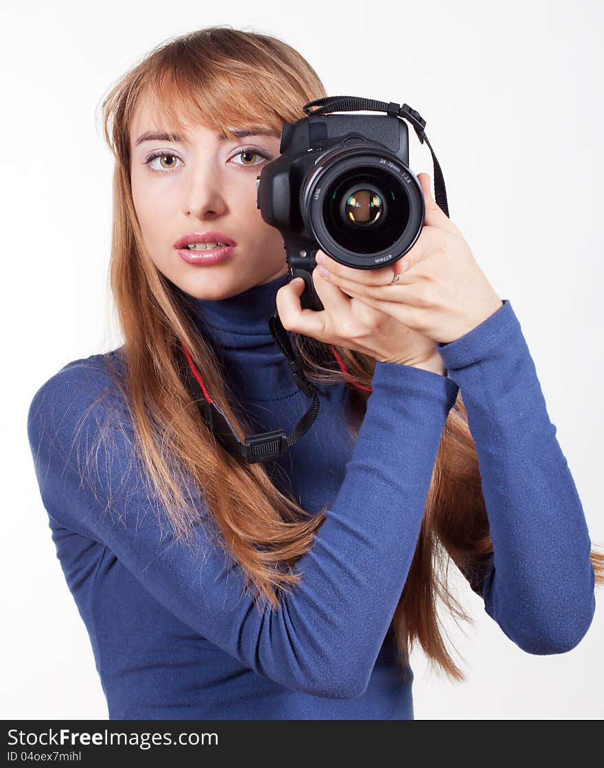 Women with camera isolated on white background at studio.