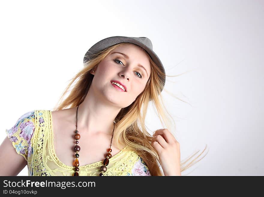 Girl with hat, isolated on white