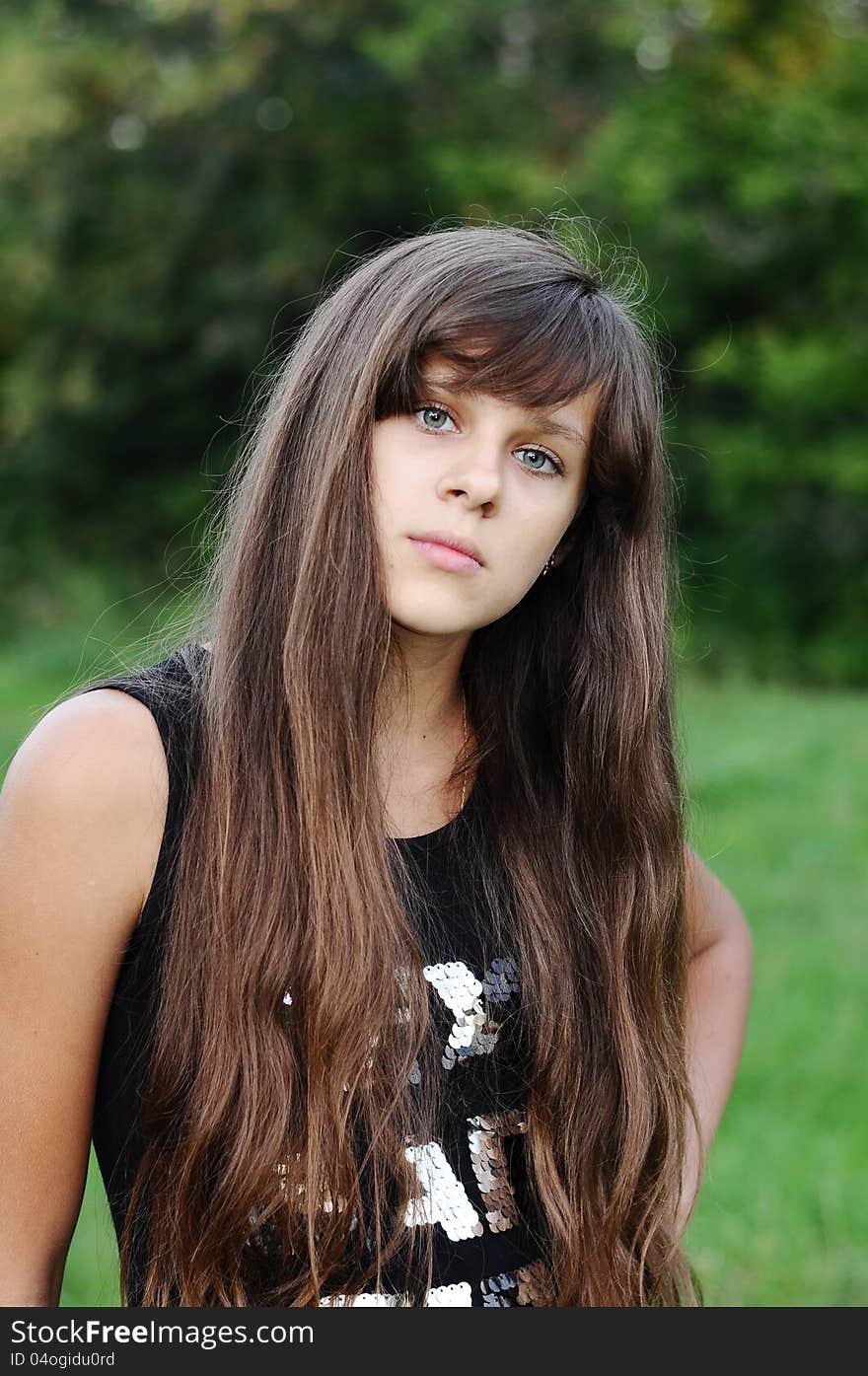 Brunette Teen Girl On Nature