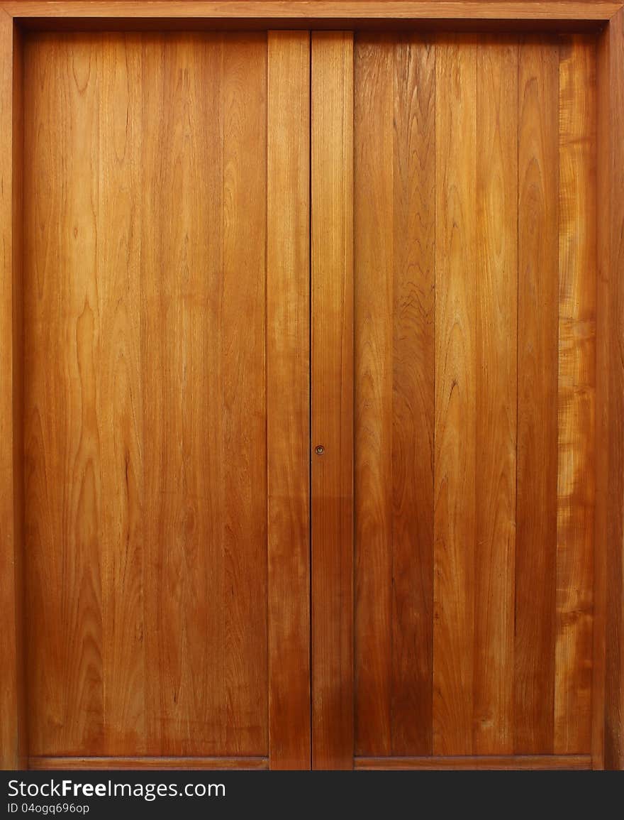 Teak wooden door with natural color