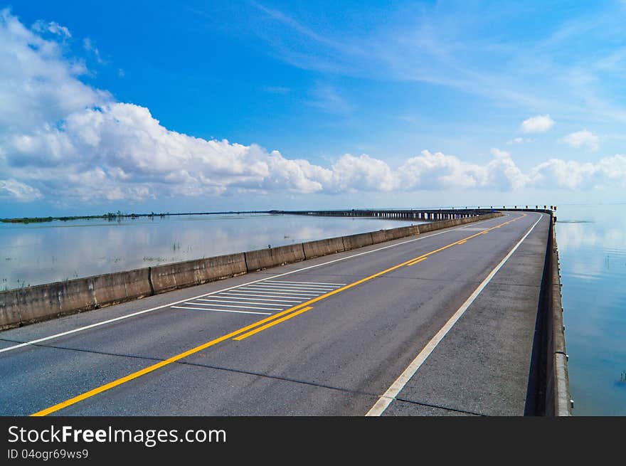 Empty road over Wetlands in the world.