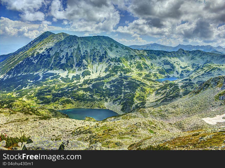 A beautiful high mountain landscape from Todorka peak in Pirin mountain in Bulgaria. A beautiful high mountain landscape from Todorka peak in Pirin mountain in Bulgaria