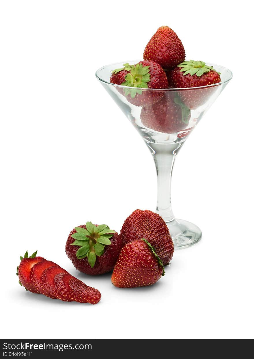 Strawberry in a glass and near to it on a white background. Strawberry in a glass and near to it on a white background.