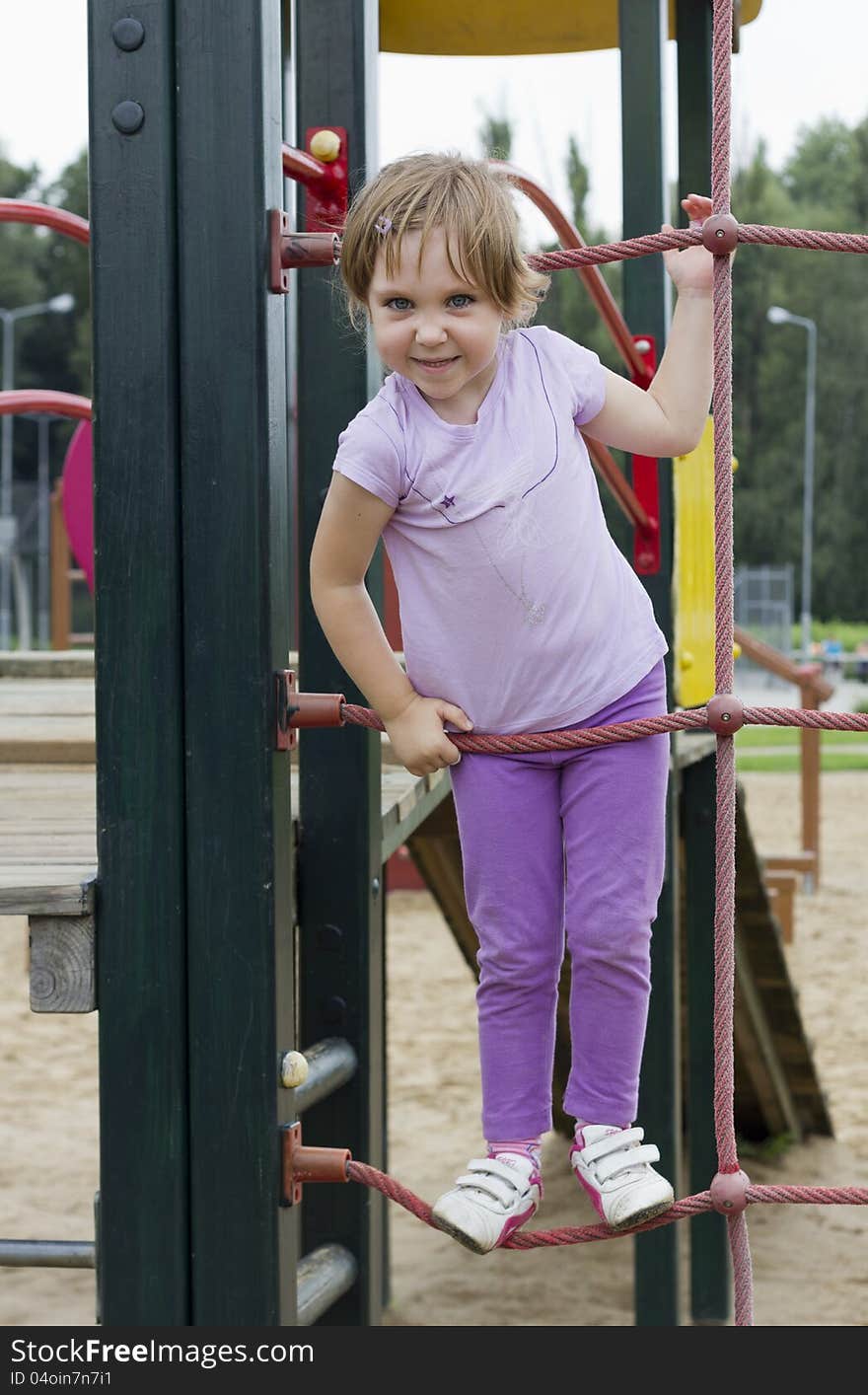 Sweet little girl on the playground. Sweet little girl on the playground