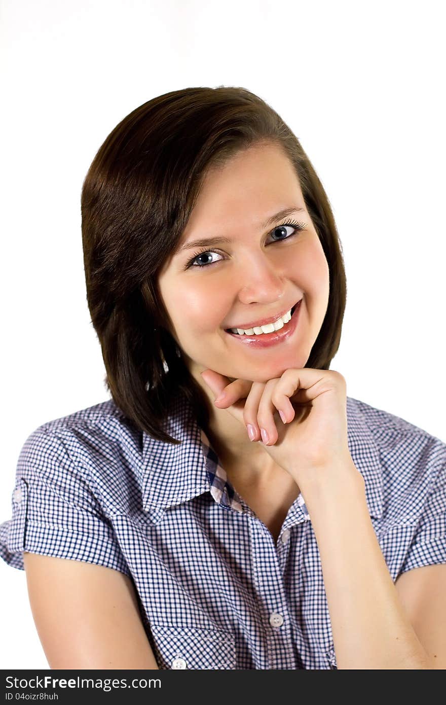 Attractive young woman resting her chin on hand