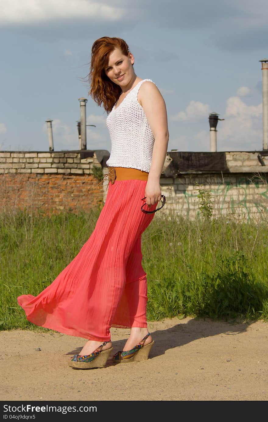 Red-haired girl posing