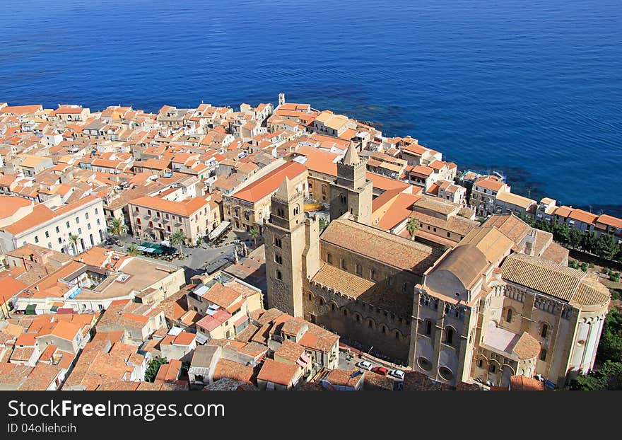 Cefalu cathedral and town taken from La Rocca , meaning the head like rocky mountain behind the historical town. Cefalu cathedral and town taken from La Rocca , meaning the head like rocky mountain behind the historical town