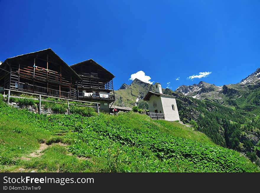 Traditional alpine architectute. Mountain houses in Alpenzu, Gressoney, Aosta Valley. Traditional alpine architectute. Mountain houses in Alpenzu, Gressoney, Aosta Valley.