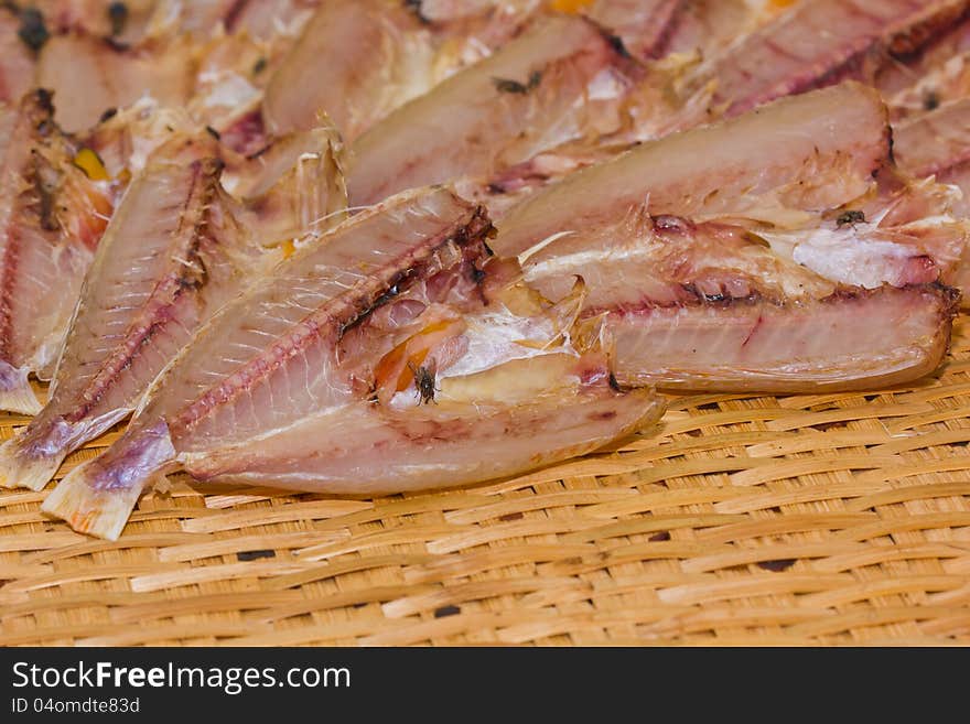 Dried fish on the panel