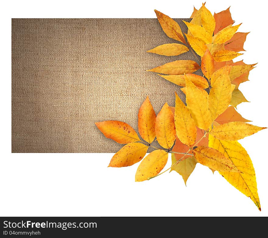 Border made from autumn leaves on canvas background with free space for text. Border made from autumn leaves on canvas background with free space for text