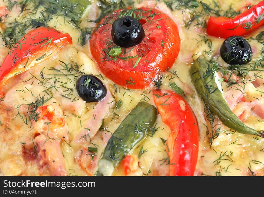 Closeup of freshness pizza with black olives, tomatoes and other ingredients. Closeup of freshness pizza with black olives, tomatoes and other ingredients