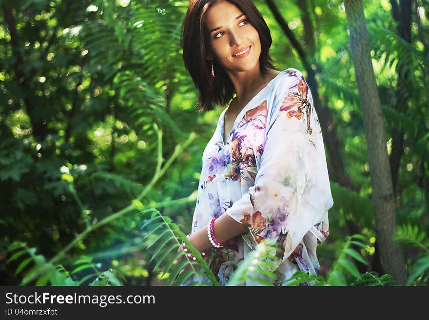 Gorgeous woman walking in tropical forest. Gorgeous woman walking in tropical forest