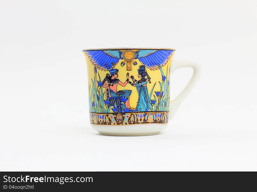 An Arabic cup of coffee painted in an Egyptian scheme. The scheme depicts Pharaonic times. An Arabic cup of coffee painted in an Egyptian scheme. The scheme depicts Pharaonic times.