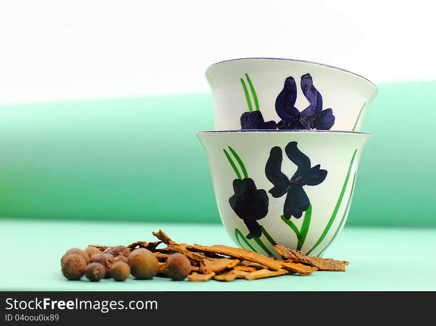 Two Green-Themed Arabic Coffee Cups