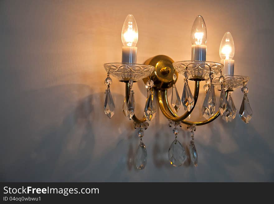 Classical Style Old Beautiful Crystal Chandelier on the wall. Classical Style Old Beautiful Crystal Chandelier on the wall