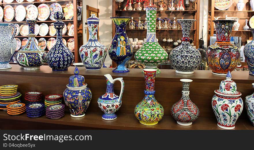 Colorful sales display of hand-painted vases and plates from Turkey. Colorful sales display of hand-painted vases and plates from Turkey.