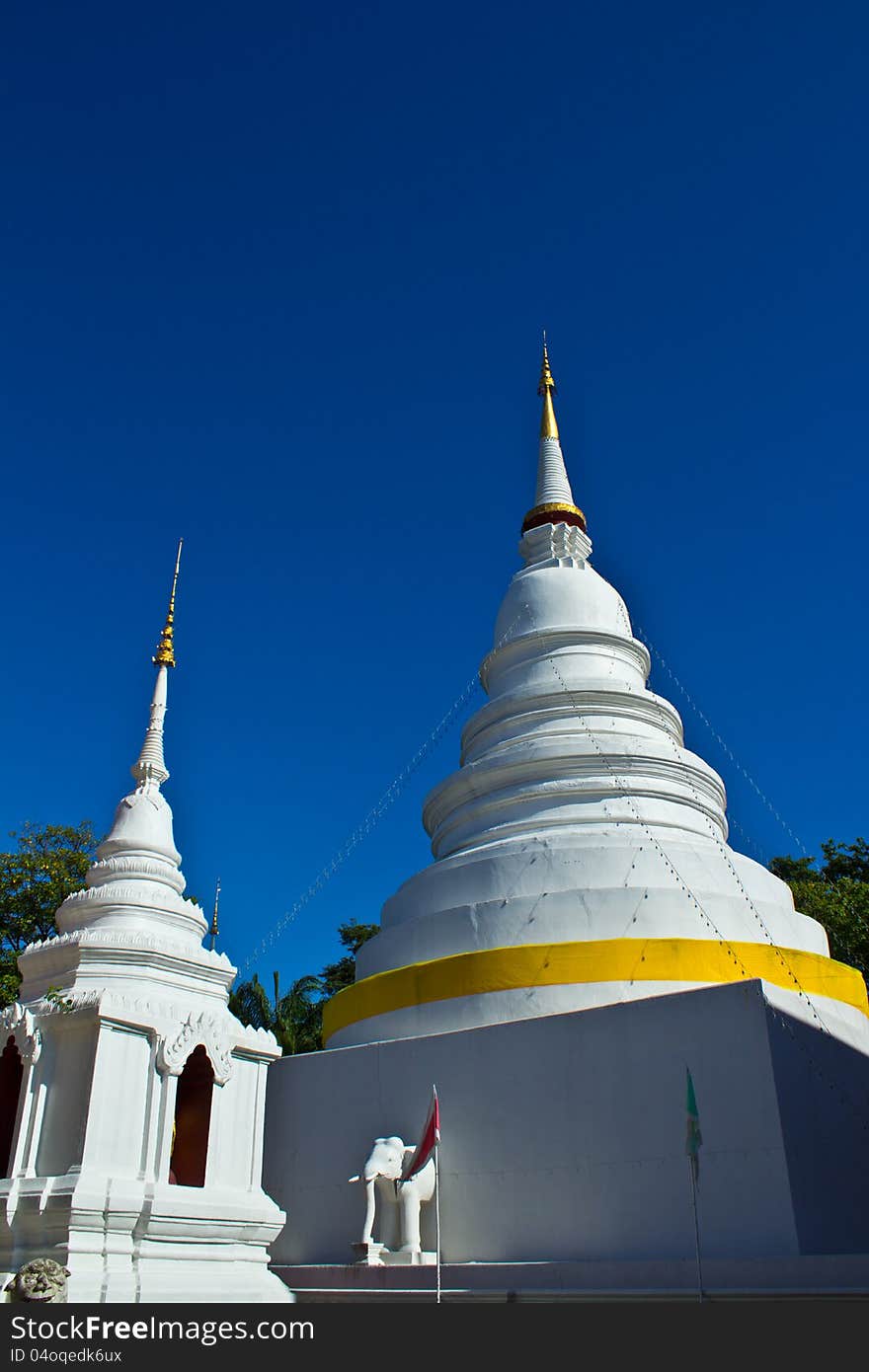 Two Chedi  S At Wat Phra Singh With Blue Sky